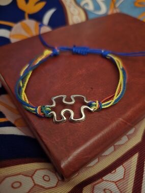 Autism Awareness And Acceptance Rainbow Cord Bracelet with Silver Puzzle Charm